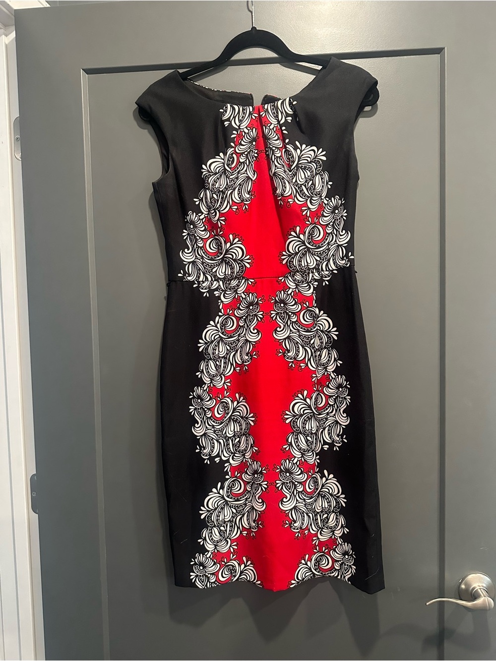le chateau Black Dress with Red and White Scroll Panel